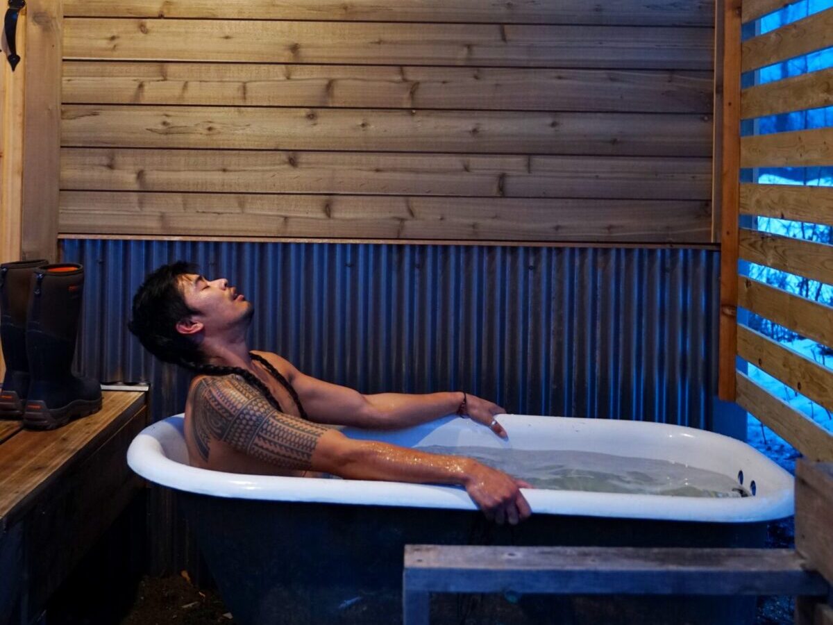relaxing in the cold plunge tub at for-rest retreat